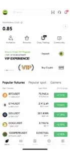 Bitunix A crypto trading app interface displays a total balance of 0.85 USD, a VIP program invitation, deposit options, and a list of popular futures like BTCUSDT, ETHUSDT, SOLUSDT, DOGEUSDT, and 1000PEPEUSDT with their prices and gains.