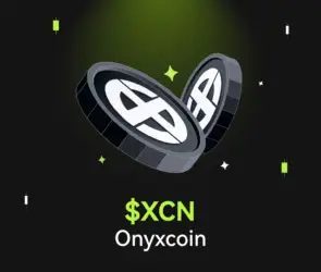 Bitunix Two black XCN coins with a white X symbol float above a dark grid background accented in green and white. Below the coins, bold text reads $XCN Onyxcoin.