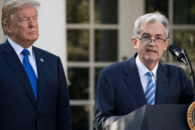 Donald Trump and Jerome Powell during a policy speech that influenced Bitcoin markets.