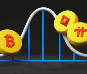 Three yellow coins with cryptocurrency symbols roll down a blue and white roller coaster track, against a black background, illustrating the volatility of digital currencies.