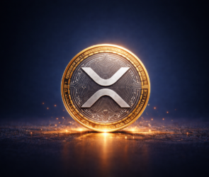 Bitunix A glowing XRP cryptocurrency coin stands upright on a dark, reflective surface, surrounded by golden sparks, with circuitry patterns and the XRP logo visible.
